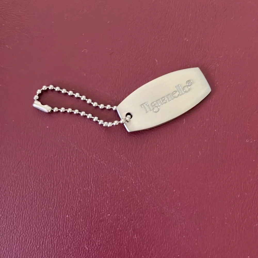Vintage 90s silver toned Tignanello key chair charm fob for purse bag